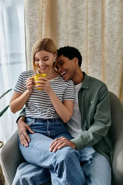 A young couple enjoys a quiet moment together in their apartment. — Stock Photo