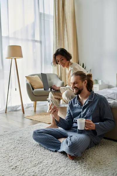 A loving couple spends a relaxing morning at home, enjoying each others company. — Stock Photo