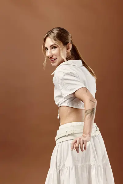 A young woman with vitiligo poses in a white summer outfit, showcasing her confidence and beauty. — Stock Photo