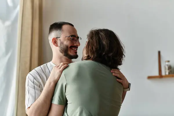 A couple shares a tender embrace, their love radiating in their smiles. — Stock Photo