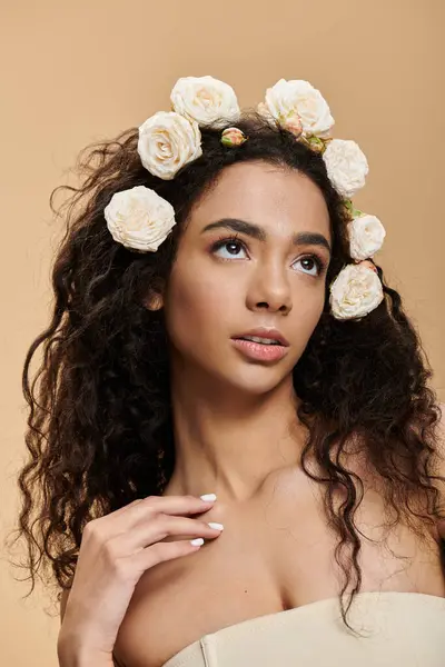 A young woman with natural makeup and a flower crown, gazing upwards. — Stock Photo
