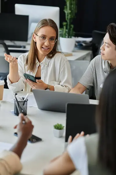Young pros collaborate on a startup project in a modern office — Stock Photo