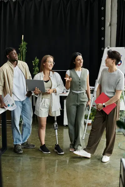 Four professionals in a modern office collaborate on startup ideas — Stock Photo