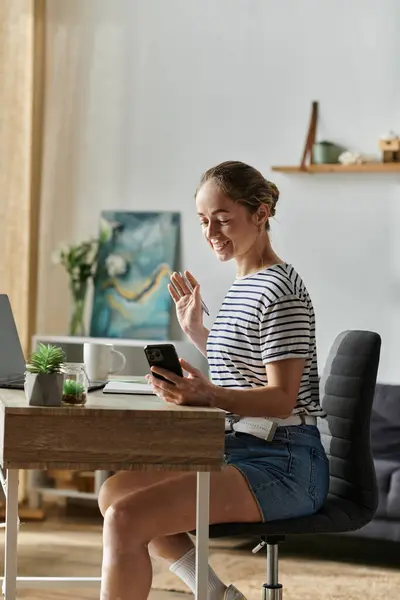 A joyful young woman connects with others, showcasing her vibrant spirit. — Stock Photo