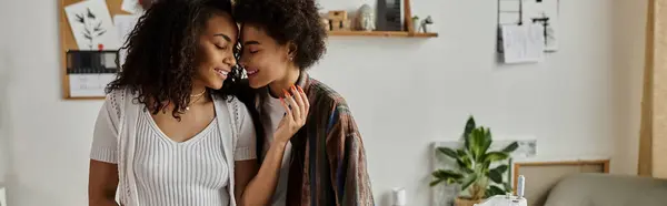 A loving couple creatively breathes new life into their garments. — Stock Photo