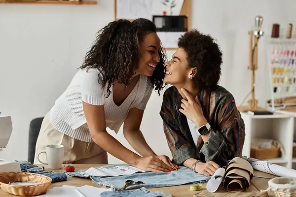 A couple joyfully transforming their clothes together with creativity. — Stock Photo