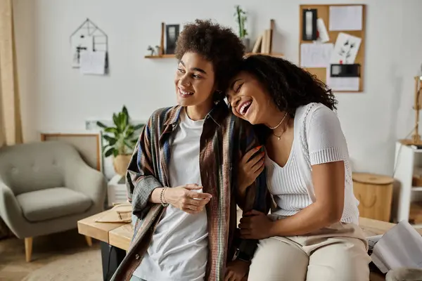 Caring couple joyfully posing, inviting workspace. — Stock Photo