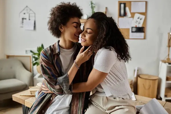 Appealing couple joyfully posing, inviting workspace. — Stock Photo
