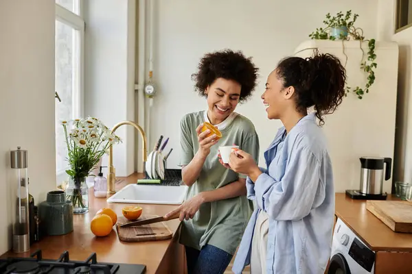 A caring couple shares laughter while preparing food at home. — Stock Photo
