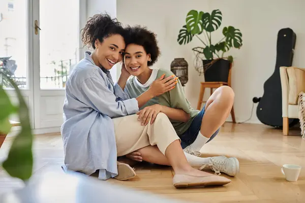 A loving couple enjoys a cozy moment together indoors. — Stock Photo