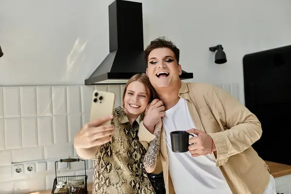 Two friends enjoy a joyful moment while taking a selfie at home. — Stock Photo