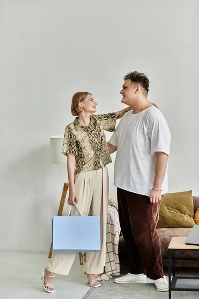 Two friends share a joyful moment in a bright, inviting living space. — Stock Photo