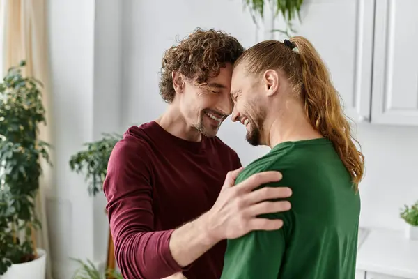 A joyous embrace filled with love between two partners at their cozy home. — Stock Photo