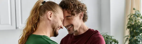A loving couple exchanges warm smiles and intimate moments in their cozy living room. — Stock Photo