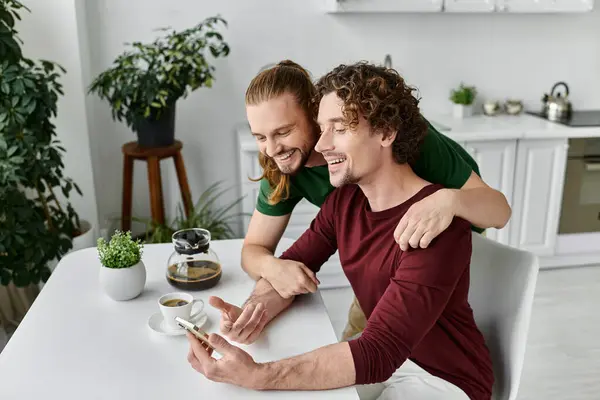 A loving couple shares laughter over coffee while enjoying their morning. — Stock Photo