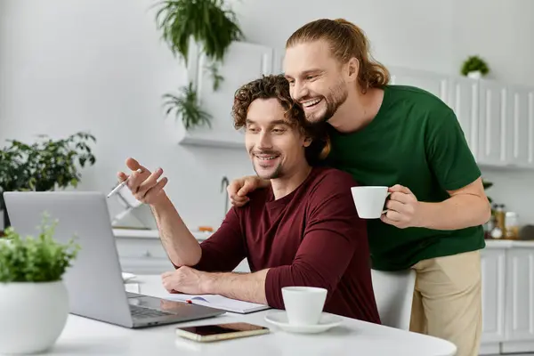 A loving couple enjoys a cheerful conversation over coffee at home. — Stock Photo