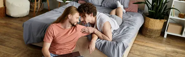 A loving couple shares a quiet, intimate moment on their bed. — Stock Photo
