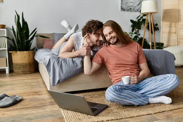 A couple shares a tender moment while enjoying each other. — Stock Photo