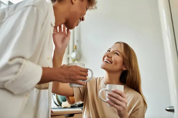 A happy couple shares intimate moments while enjoying their coffee. — Stock Photo