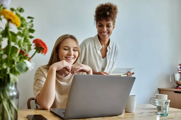 Two partners enjoy a playful moment together while browsing online. — Stock Photo