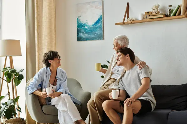 Joyful moments shared between loving parents and their son in a bright, inviting space. — Stock Photo