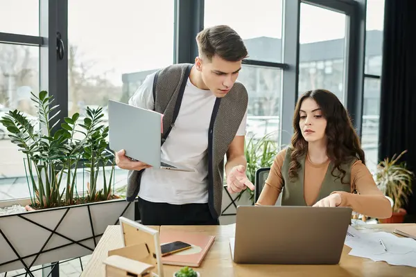Professionals engage in a crucial discussion in office. — Stock Photo