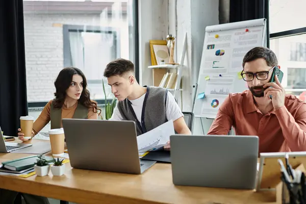 Team members discuss work plans in a modern office. — Stock Photo