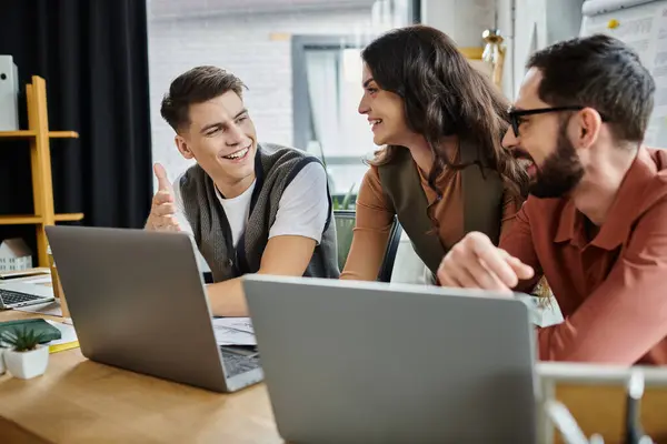 Professionals engage in a supportive conversation in office. — Stock Photo