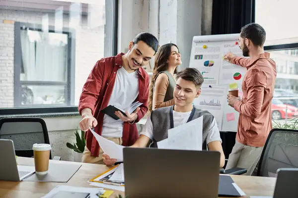Colleagues interact casually while at workplace. — Stock Photo