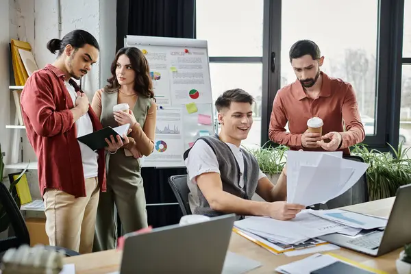 Team members engage in discussions, balancing professionalism and style. — Stock Photo