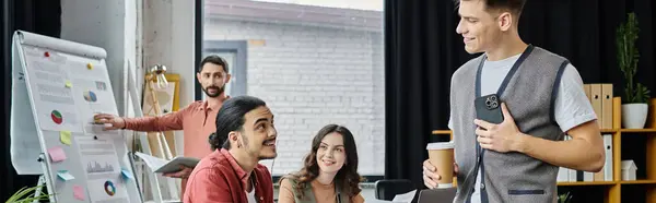 Colleagues share smiles and support during work. — Stock Photo