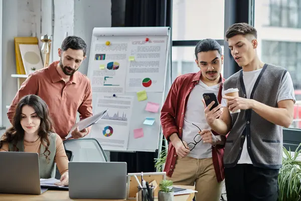 Team members engage and discuss important updates in a stylish office atmosphere. — Stock Photo