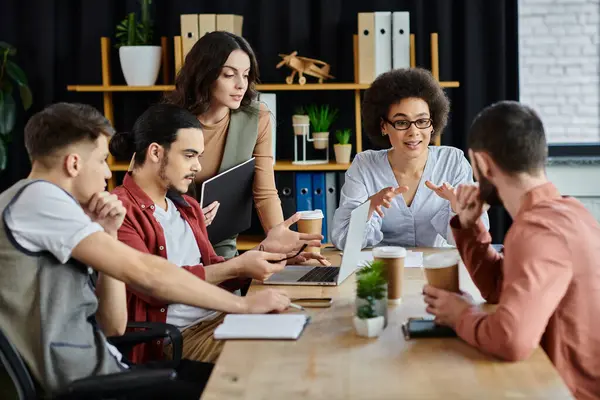 Team members converse thoughtfully amidst a challenging time. — Stock Photo