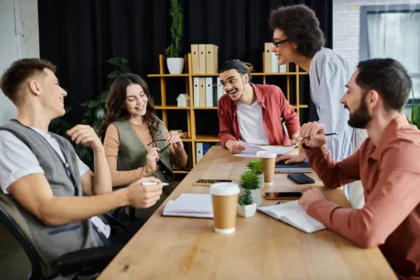 Team members share smiles and thoughts amid challenging conversations. — Stock Photo