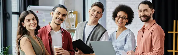 Supportive colleagues gather to discuss changes in a relaxed office environment. — Stock Photo