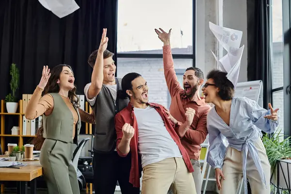 Team members express joy and support amidst a challenging time. — Stock Photo