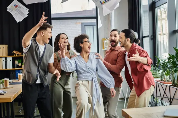 Team members share joyful moments while facing a challenging time. — Stock Photo