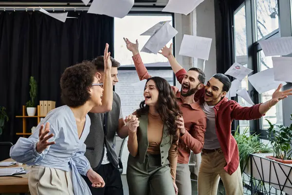 Excited colleagues share a moment of joy. — Stock Photo