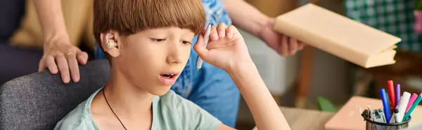 A loving mother engages with her hearing impaired son during a playful afternoon. — Stock Photo