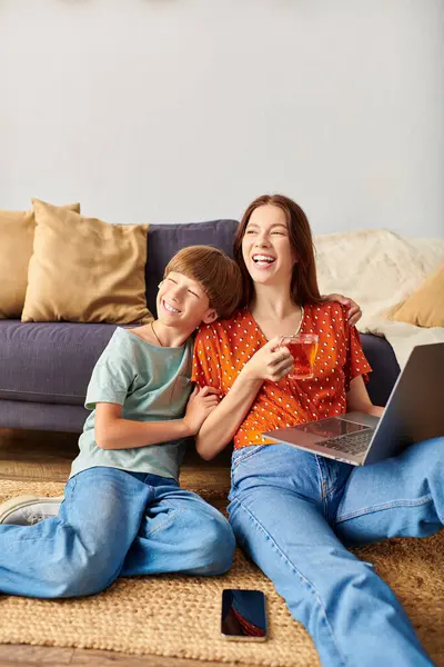 A joyful moment of a mother and her hearing impaired son enjoying each other. — Stock Photo