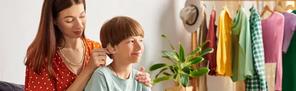 A mother lovingly engages with her hearing impaired son while sharing quality moments. — Stock Photo