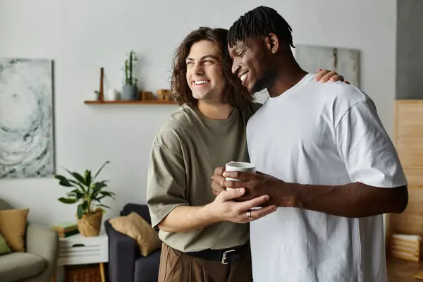 Two affectionate partners enjoy a warm moment together, radiating happiness in their cozy home. — Stock Photo