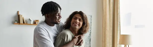 A loving couple shares laughter and warmth in their inviting living space during a quiet evening. — Stock Photo