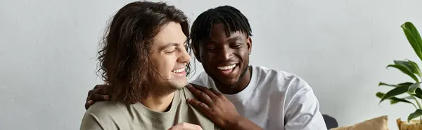 A happy couple enjoys quality time together at home, sharing laughter and love on a bright day. — Stock Photo
