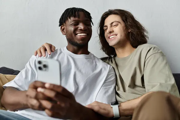 A happy couple shares a tender moment at home, enjoying each other and smiles. — Stock Photo