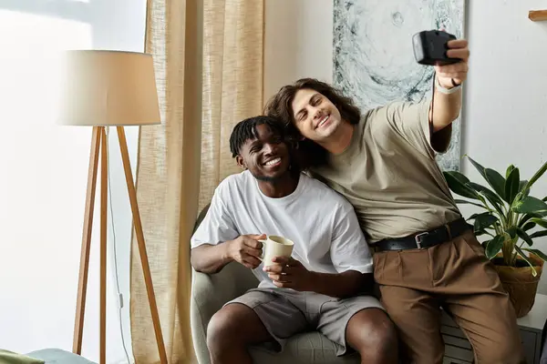 Two men enjoy a cozy moment together, capturing their happiness in a shared selfie. — Stock Photo