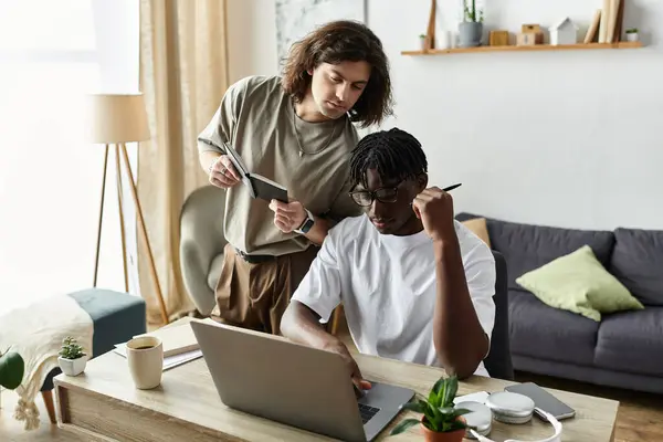 Two partners enjoy each other while studying and collaborating at home together. — Stock Photo