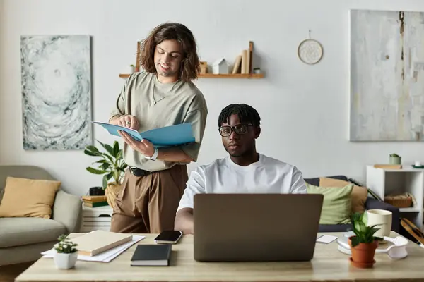 Two partners engage in work and conversation, creating a warm, loving atmosphere at home. — Stock Photo