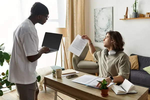 A loving couple engages in a productive discussion while surrounded by their cozy living space. — Stock Photo