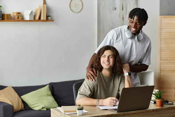 A couple enjoys a relaxed afternoon together, collaborating and sharing laughter at home. — Stock Photo